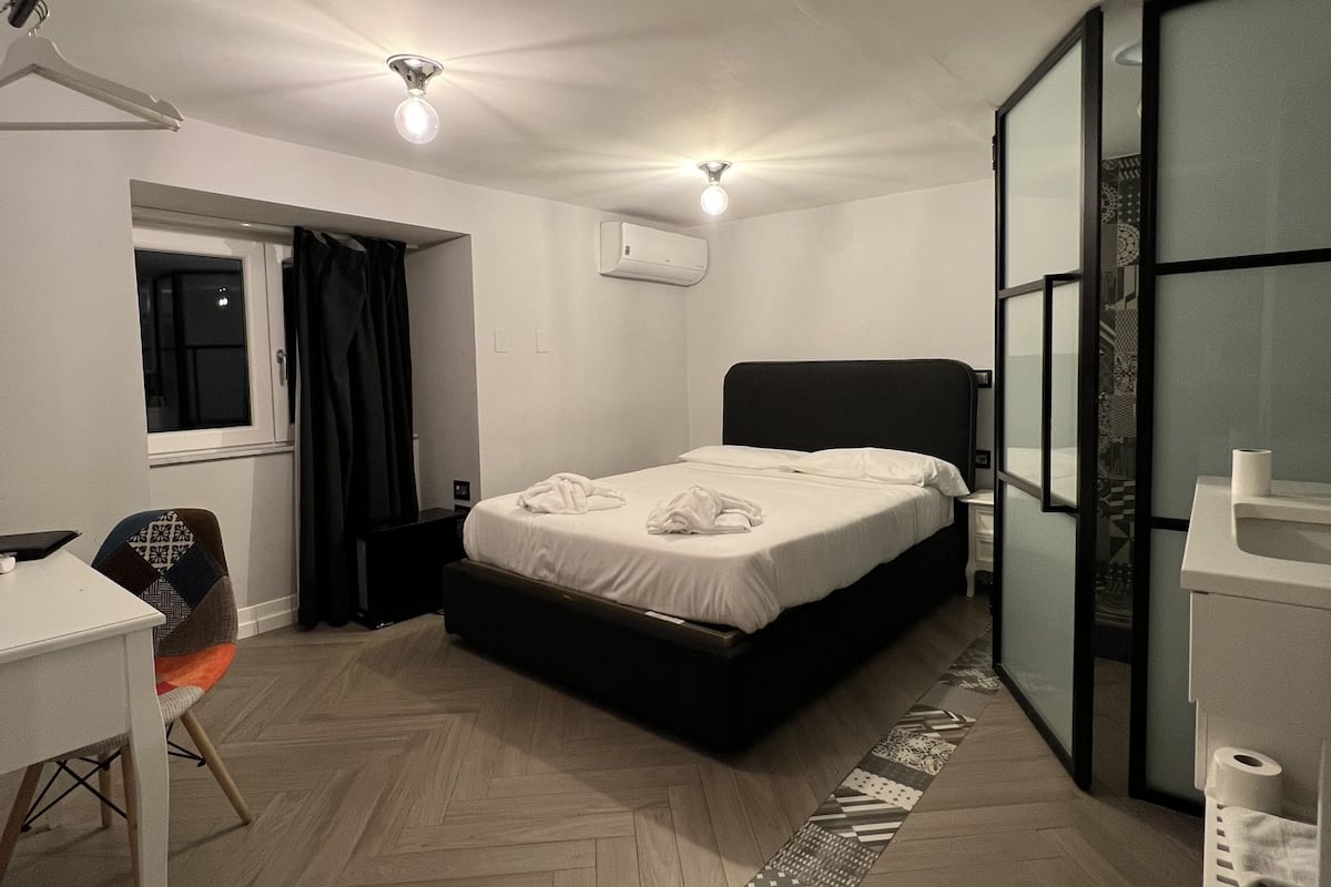 Economy Double Room | 1 bedroom, premium bedding, down comforters, minibar