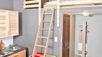 Grand Studio Suite | Private kitchenette | Fridge, stovetop, electric kettle, cookware/dishes/utensils