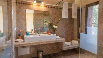 Free toiletries, hair dryer, slippers, towels