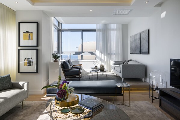 Penthouse, 3 Bedrooms | Living room | Flat-screen TV - The Penthouse Collection (Cape Town)