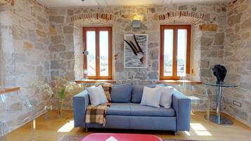 Deluxe Apartment, 2 Bedrooms, Sea View, Sea Facing | Living room | Flat-screen TV