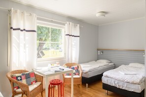 Standard Room | Desk, blackout curtains, iron/ironing board, travel cot