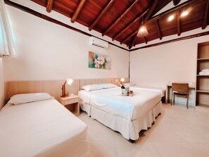 Deluxe Room, Multiple Bedrooms, Courtyard View | Premium bedding, pillowtop beds, minibar, individually furnished - Abricó Beach Hotel (São Sebastião)