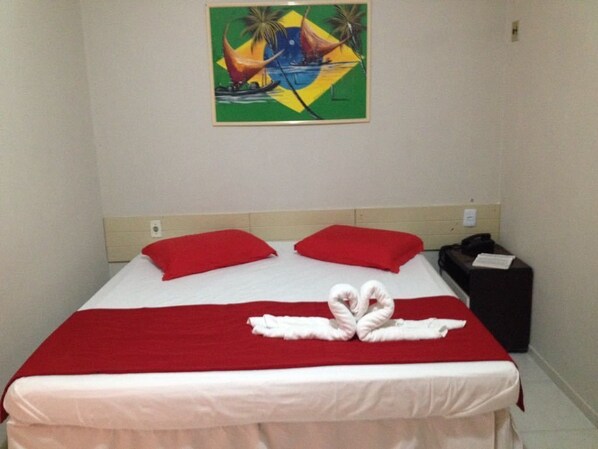 Double Room | Minibar, blackout drapes, iron/ironing board, free WiFi