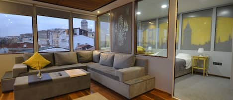 Deluxe Penthouse | Living area | LCD TV