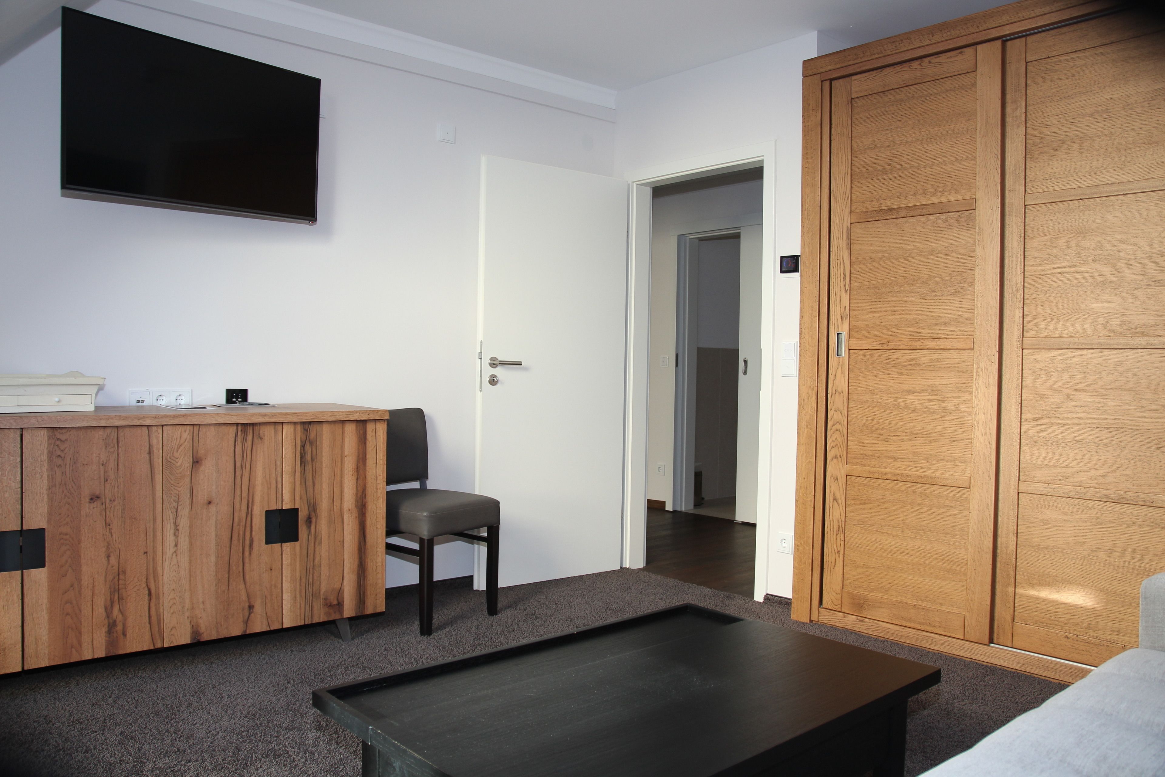 suite, 1 king bed with sofa bed, kitchenette | living area | 43-inch flat-screen tv with satellite channels, tv, ipod dock