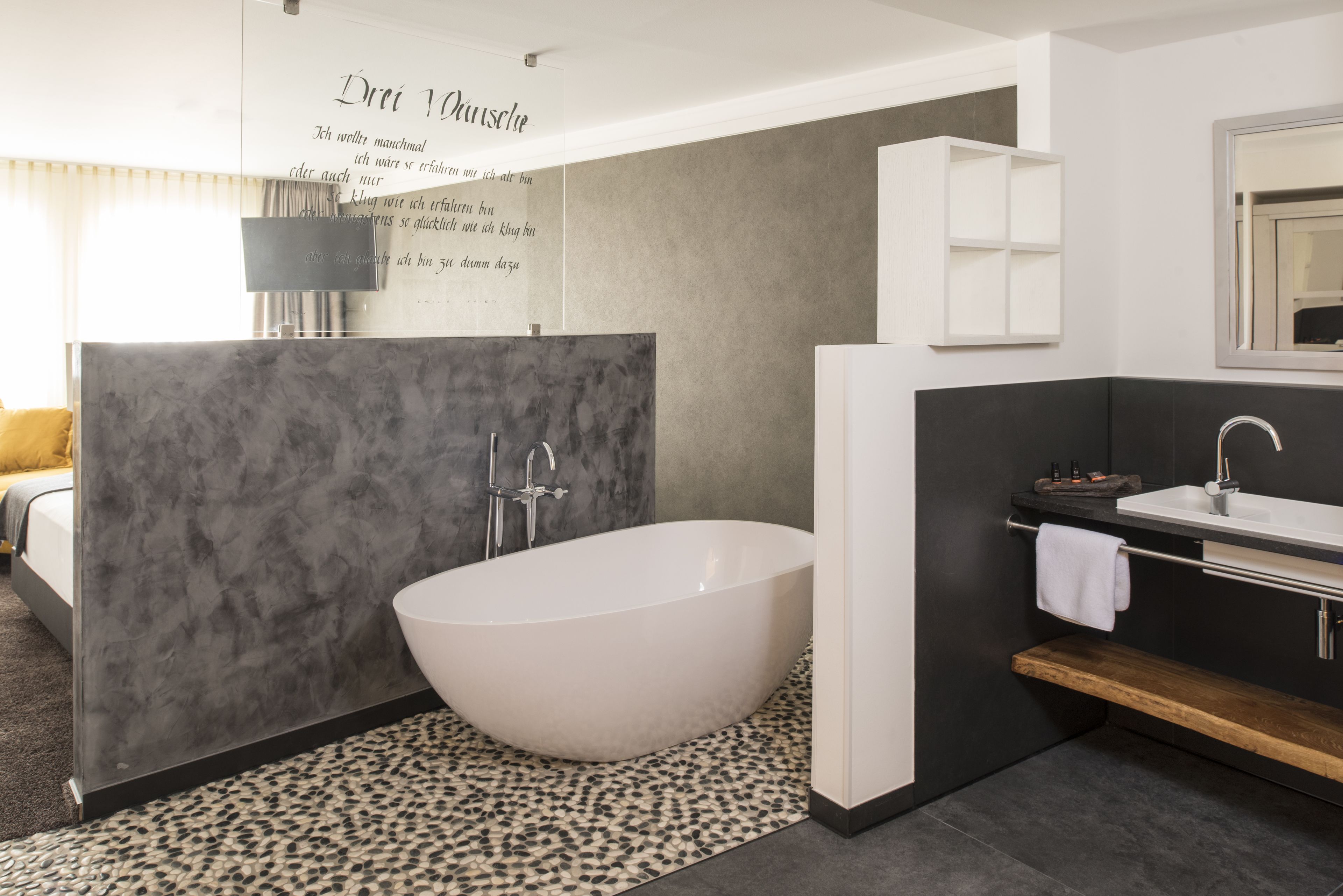 superior double room | bathroom | deep-soaking bathtub, free toiletries, hair dryer, bathrobes