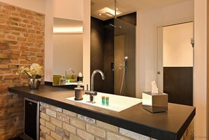 Superior Double Room | Bathroom | Deep soaking tub, free toiletries, hair dryer, bathrobes