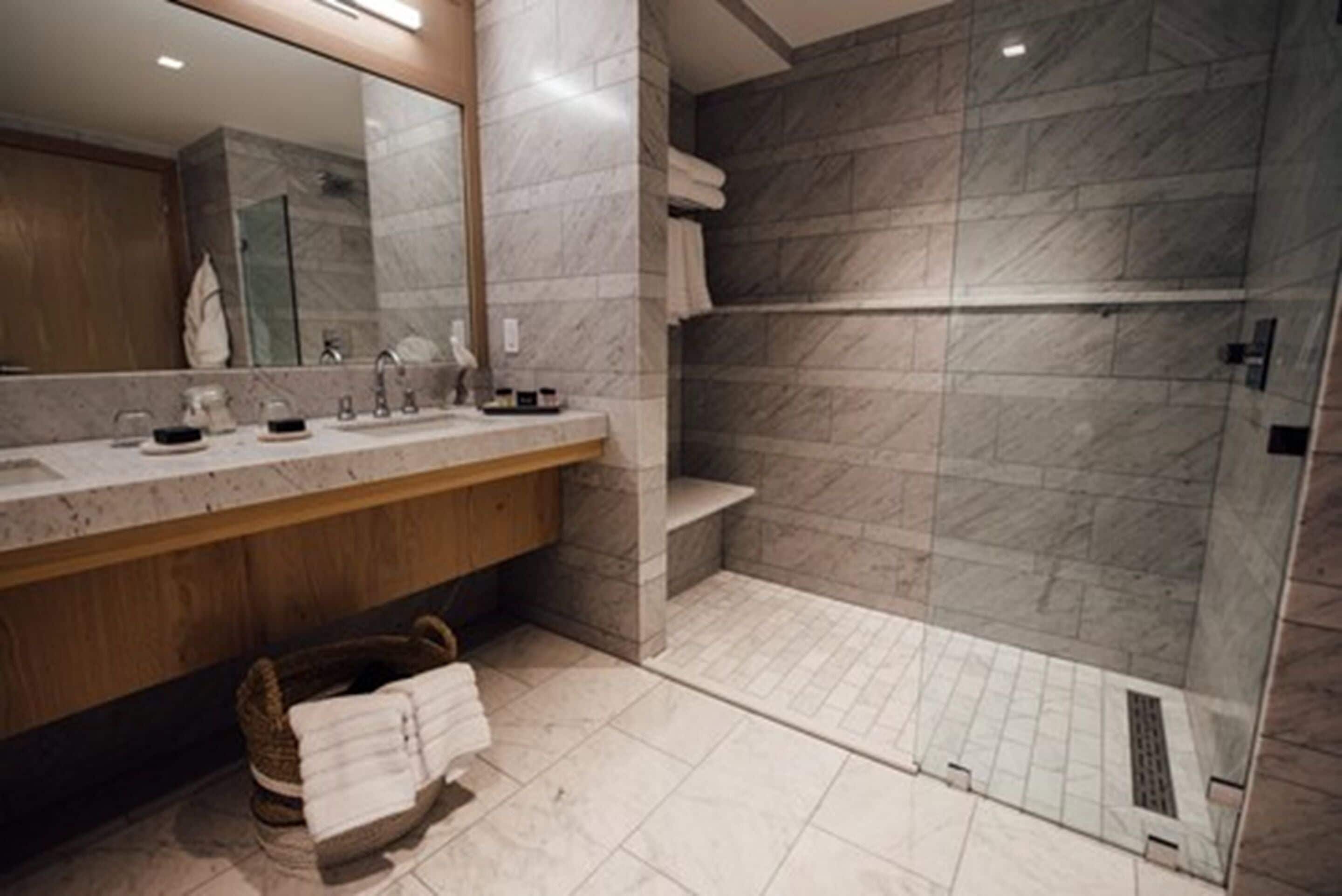 exclusive suite, 1 king bed | bathroom | shower, rainfall showerhead, free toiletries, hair dryer