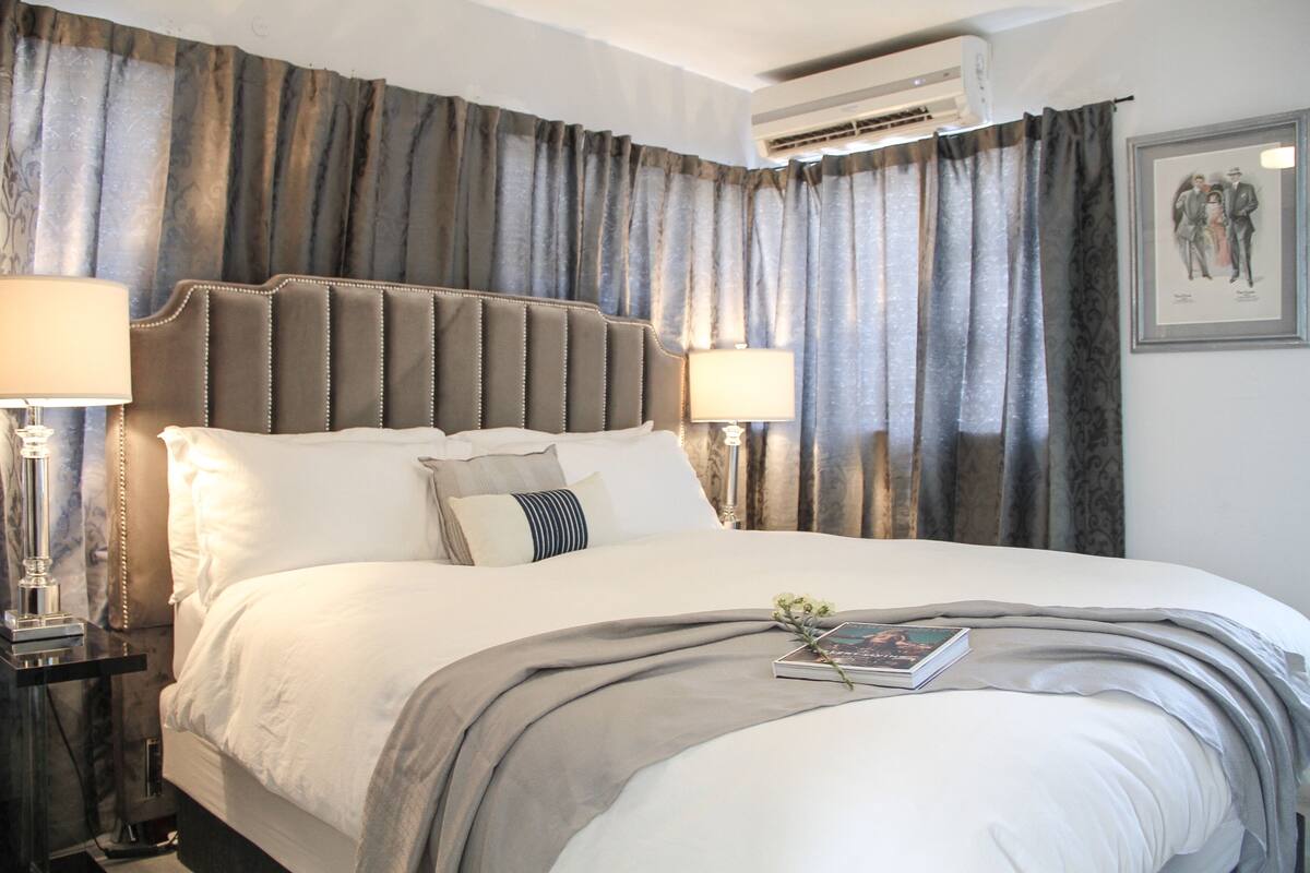 The Westcott Suites | Premium bedding, desk, iron/ironing board, bed sheets