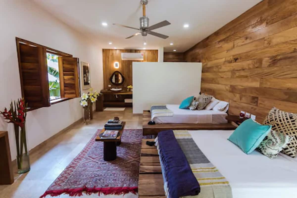 Suite Deluxe, 1 habitación | Sábanas de algodón egipcio y minibar