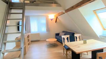 Familienstudio | Wohnbereich | 43-Zoll-Flachbildfernseher mit Kabelempfang, Fernseher