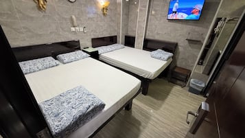 Family Room | In-room safe, blackout curtains, soundproofing, iron/ironing board