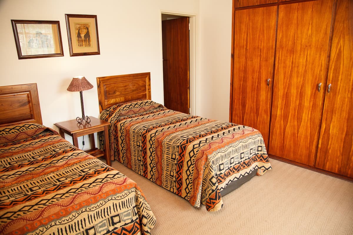 Classic Chalet, 2 Twin Beds, Resort View, Garden Area | 1 bedroom, in-room safe, blackout drapes, iron/ironing board