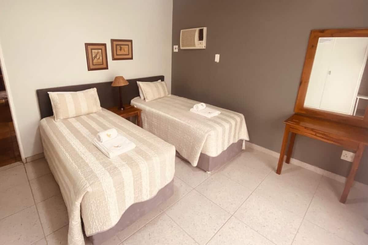 Classic Chalet, 2 Single Beds, Resort View, Garden Area | 1 bedroom, in-room safe, blackout curtains
