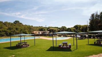 Outdoor pool, pool umbrellas, sun loungers