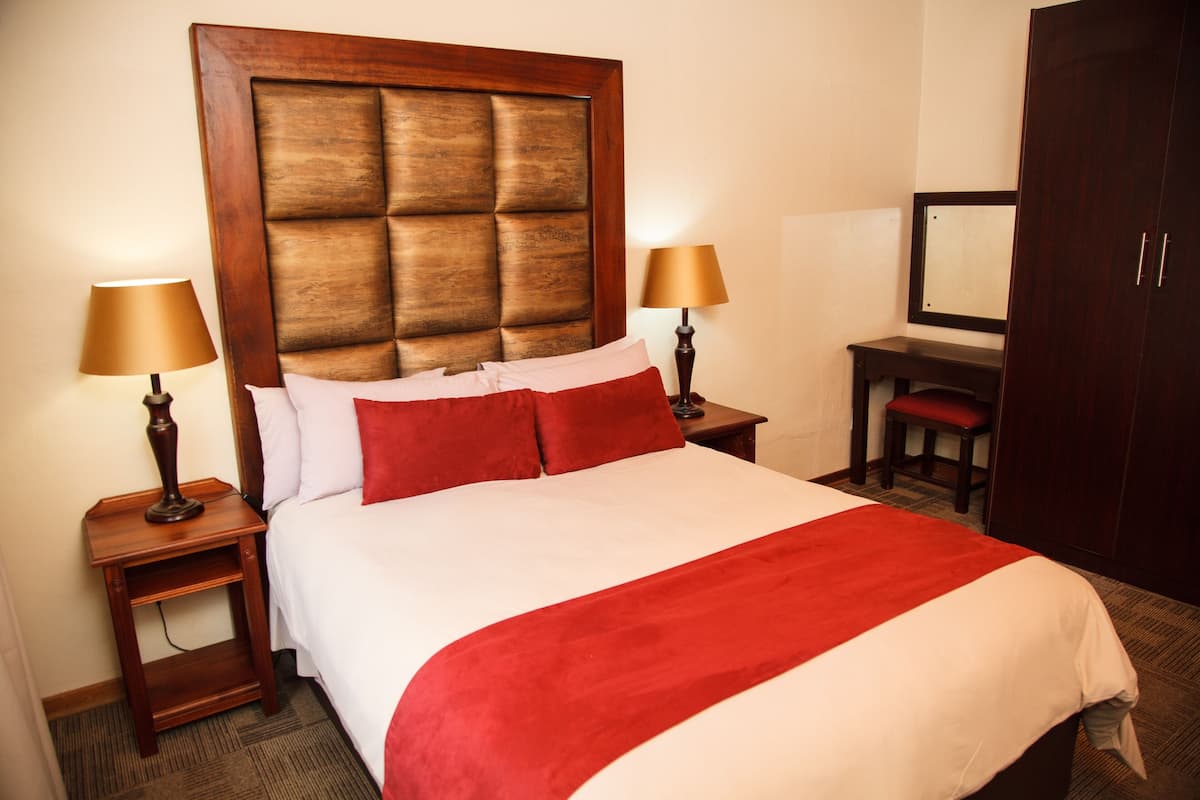 Deluxe Chalet, 2 Bedrooms, Resort View, Garden Area (3) | 1 bedroom, in-room safe, blackout drapes, iron/ironing board