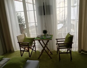 Double Room, Courtyard Area | Living area | TV