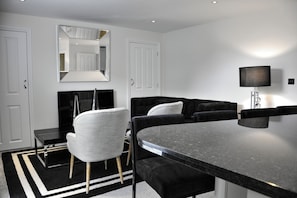 Superior Apartment, 2 Bedrooms | Living area | TV