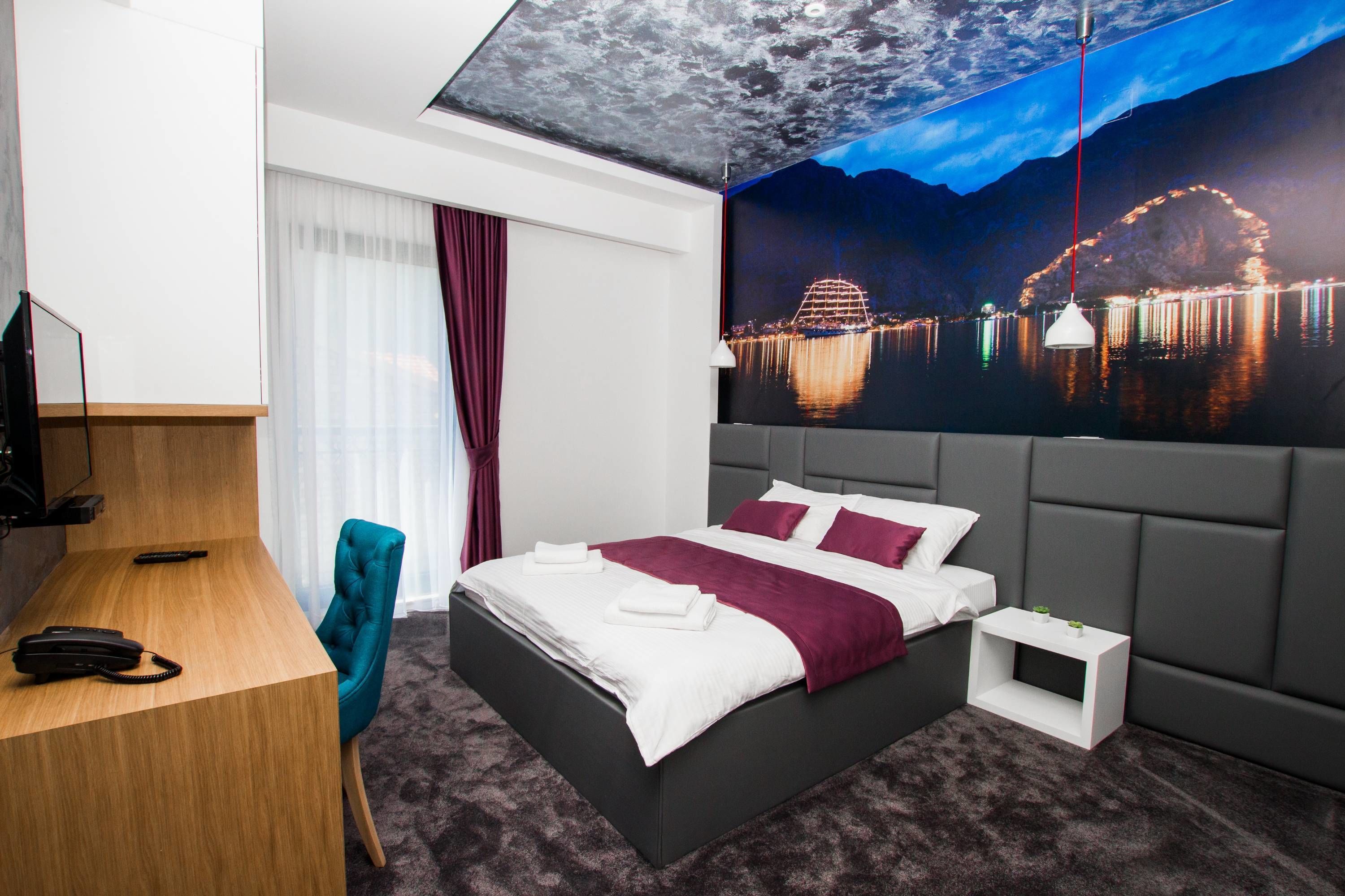 double room, 1 queen bed with sofa bed, balcony, partial sea view | premium bedding, minibar, in-room safe, desk