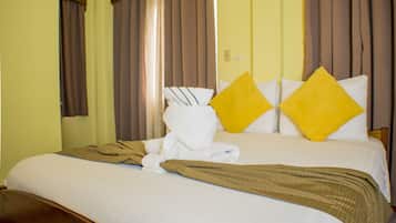 Deluxe Triple Room, 1 Double Bed, 1 Single Bed, Non Smoking | Premium bedding, in-room safe, blackout curtains, iron/ironing board