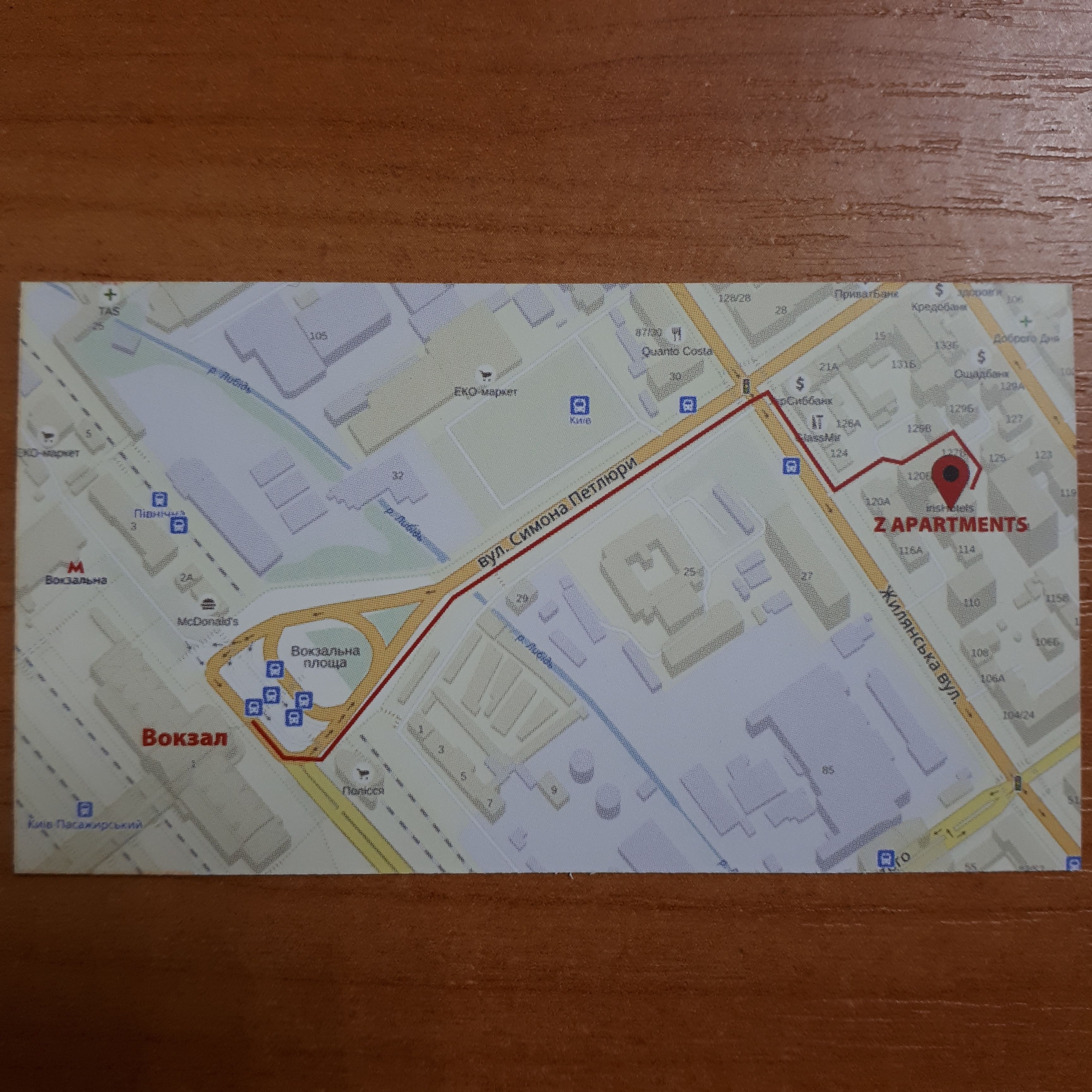 A map highlighting a route with a red line, leading to 'ZAPARTMENTS' marked with a red pin.