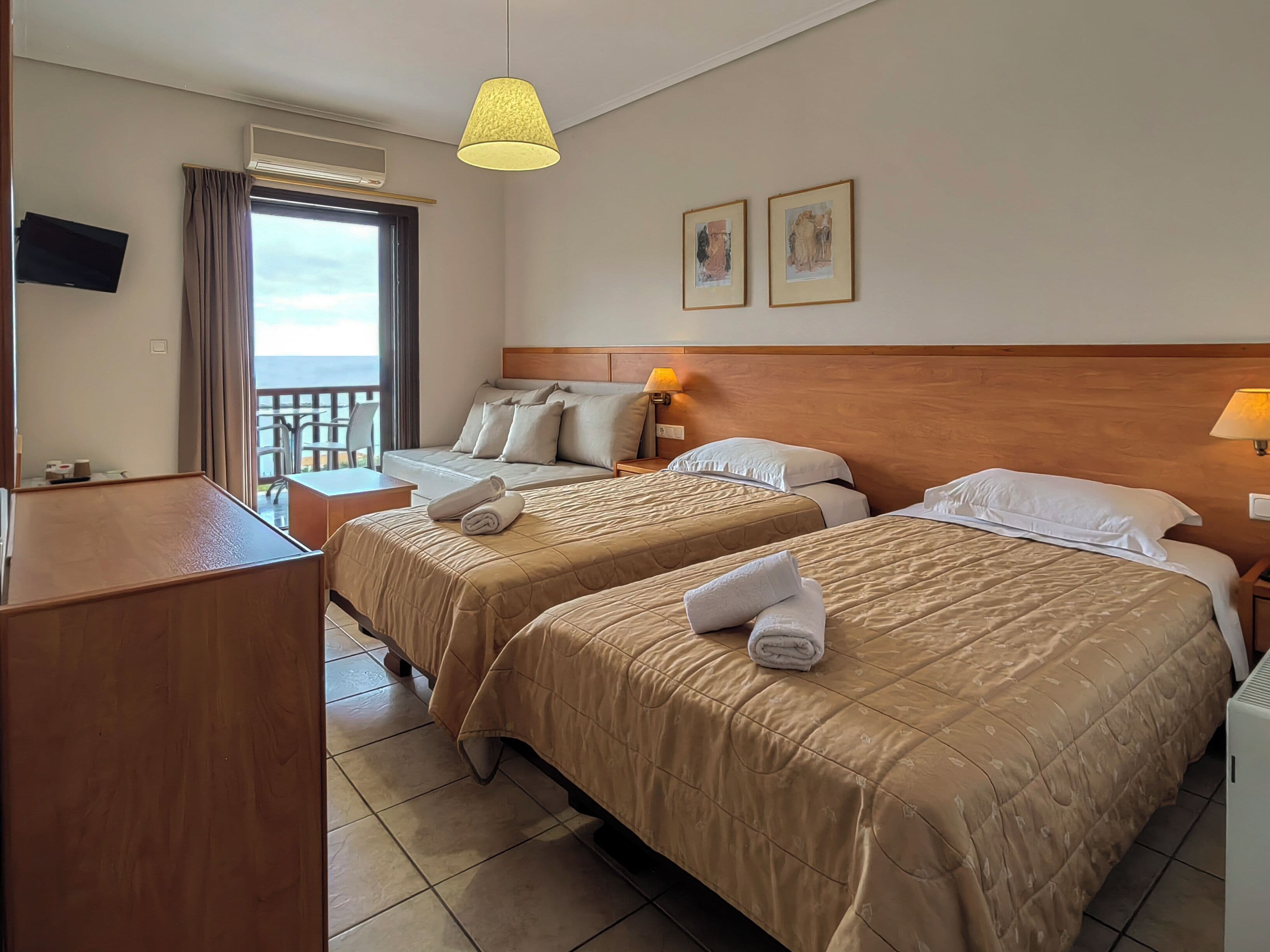 basic double or twin room, 1 bedroom, sea view | minibar, blackout curtains, iron/ironing board, free cots/infant beds