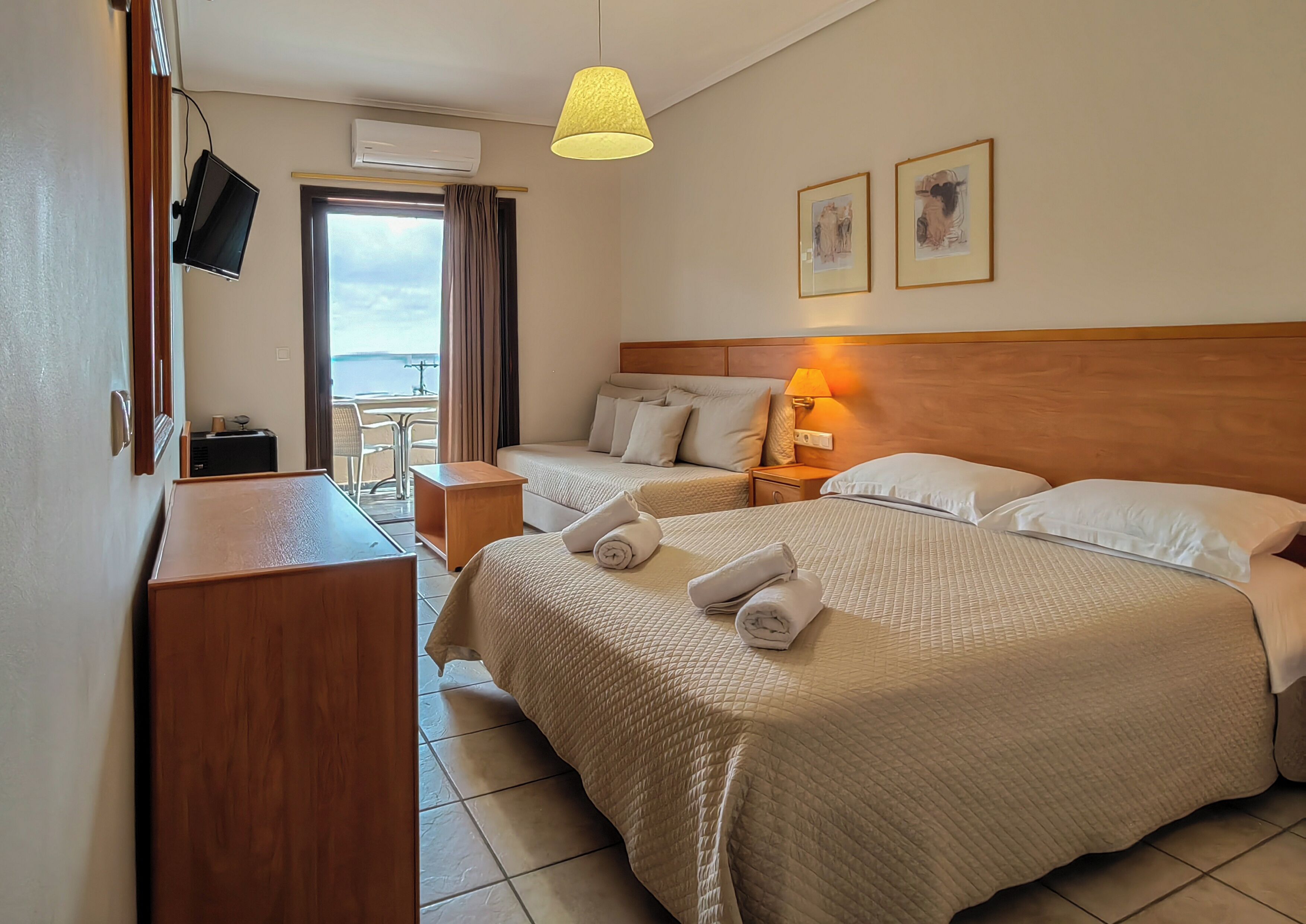 basic double or twin room, 1 bedroom, sea view | minibar, blackout curtains, iron/ironing board, free cots/infant beds