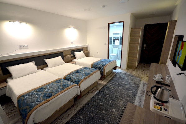 Triple Room | Premium bedding, desk, free WiFi