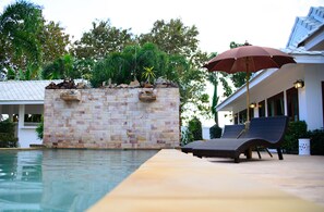 Outdoor pool, a waterfall pool, open 9:00 AM to 10:00 PM, pool umbrellas - RungNara Pool Villa (San Sai)