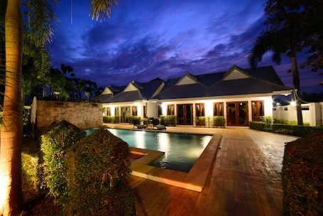 Outdoor pool, a waterfall pool, open 9:00 AM to 10:00 PM, pool umbrellas