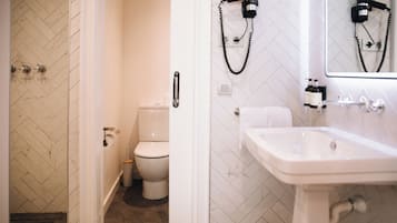 Eco-friendly toiletries, hair dryer, towels, soap