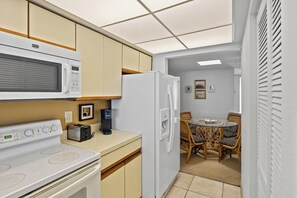 Coffee/tea maker, fridge, microwave, oven
