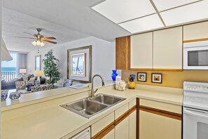 Coffee/tea maker, fridge, microwave, oven