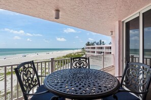 Outdoor dining - Anna Maria Island Club 26, Condo 2 Bedroom/ 2 Bath ocean view, maximum occupancy of 4 people.  Community pool, Max 1 vehicle. (Bradenton Beach)