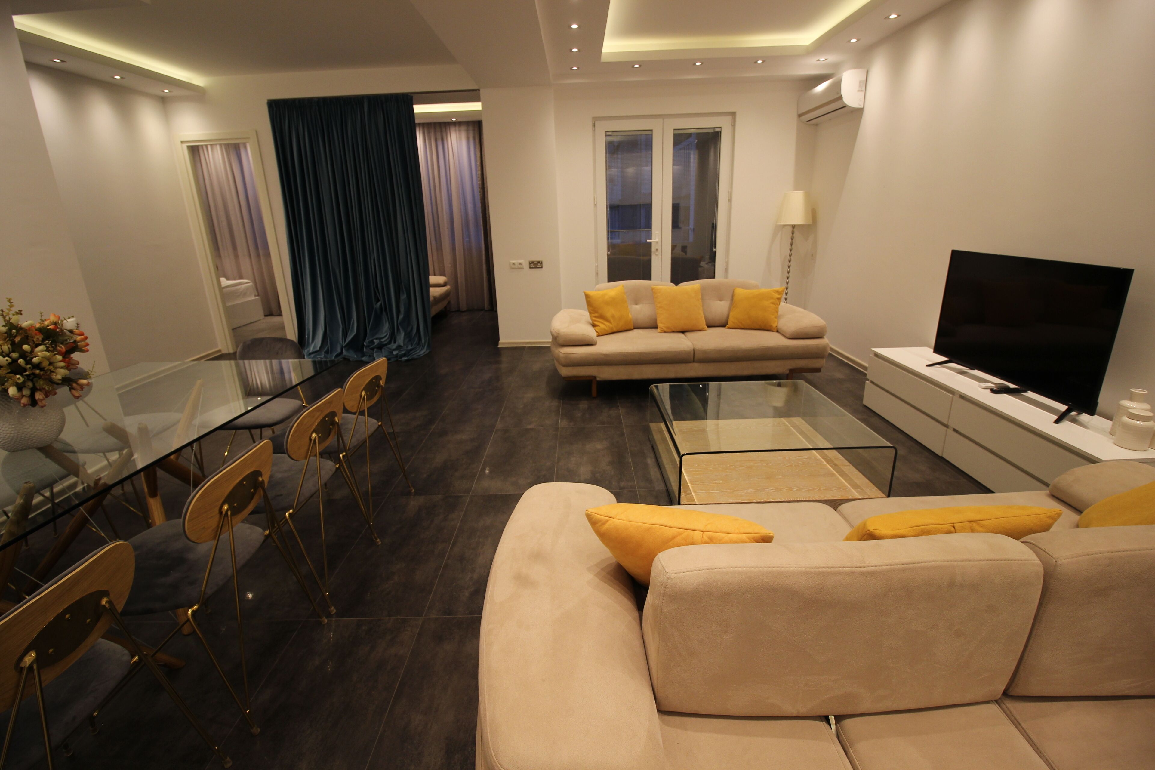 superior suite, 4 bedrooms, balcony | living area | flat-screen tv