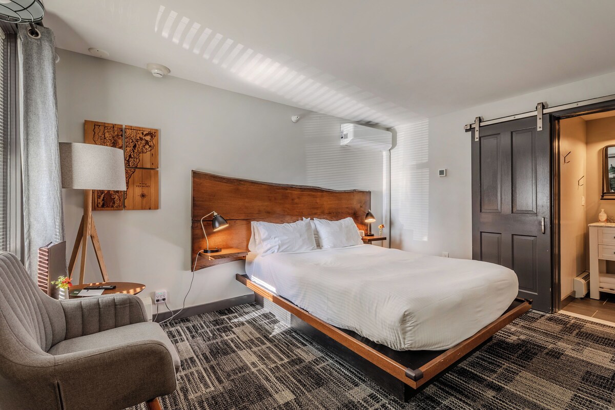 Premium bedding, memory foam beds, laptop workspace, blackout drapes