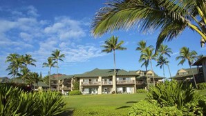 A resort with multiple-story buildings, palm trees, and a well-maintained lawn. - 1 Bedroom Condo w/Epic Ocean View - Kaha Lani 319 (LIHUE)