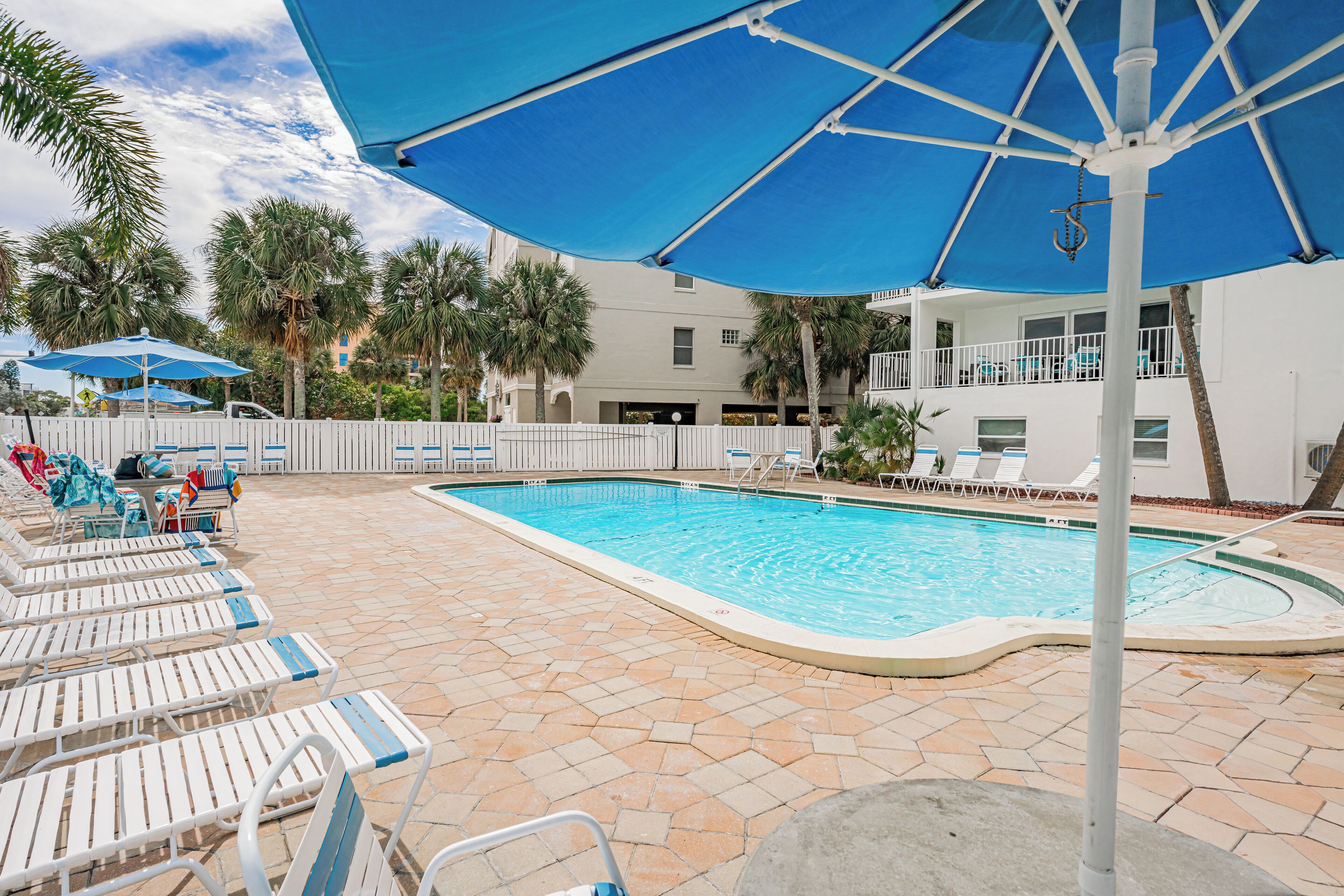Plenty of loungers and seating around pool
