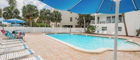 Plenty of loungers and seating around pool