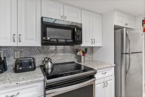 Fridge, microwave, oven, stovetop - FREE PERKS INCLUDED!! Holiday Villas II 302 - INTERCOASTAL VIEW Condo! (Indian Shores)
