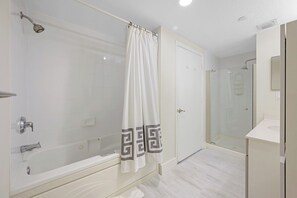 Combined shower/tub, jetted tub, hair dryer, bidet