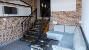 Suite Deluxe, vistas al mar | 1 dormitorio, escritorio, sistema de insonorización y wifi gratis