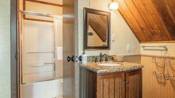 Hair dryer, towels, shampoo, toilet paper