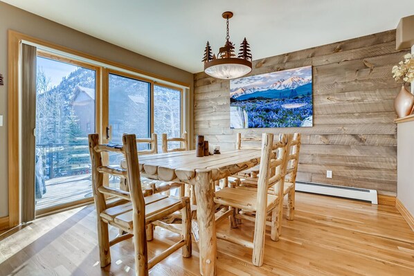 Enjoy meals in this well-equipped dining area with a view of the surrounding landscape.