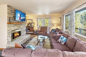 Flat-screen TV, fireplace, video games, DVD player