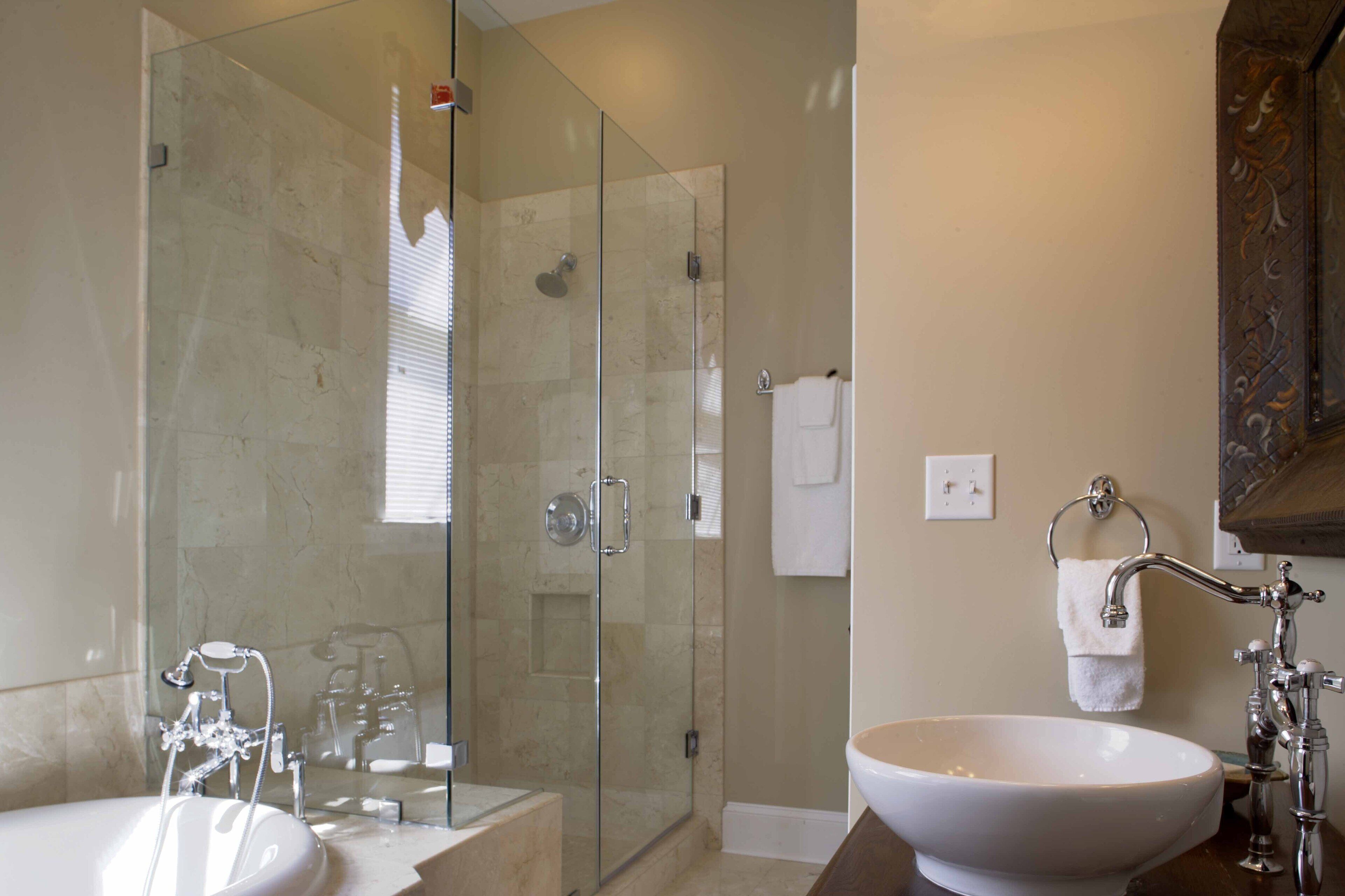 Shower, jetted tub, hair dryer, towels