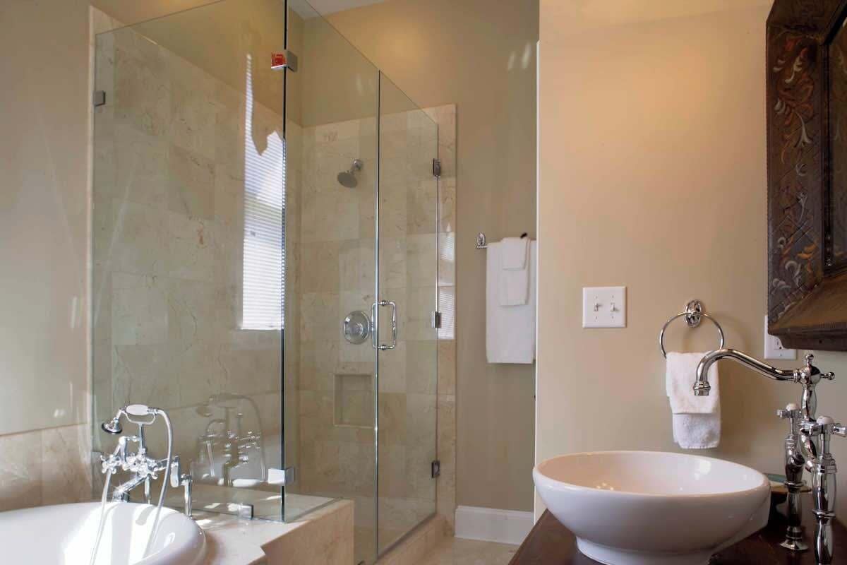 Shower, hair dryer, towels, shampoo