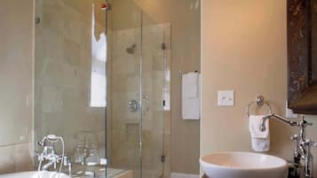 Shower, hair dryer, towels, shampoo