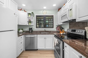 Coffee/tea maker, fridge, microwave, oven